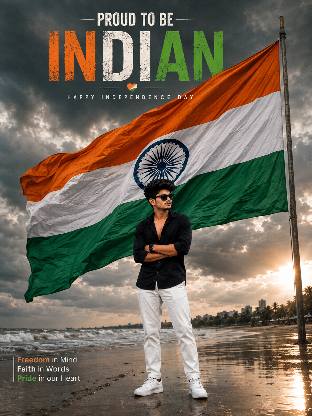 Ultra-realistic Independence Day poster of a stylish young Indian man standing confidently with folded arms on a beach in front of a giant Indian flag under a dramatic cloudy sky.